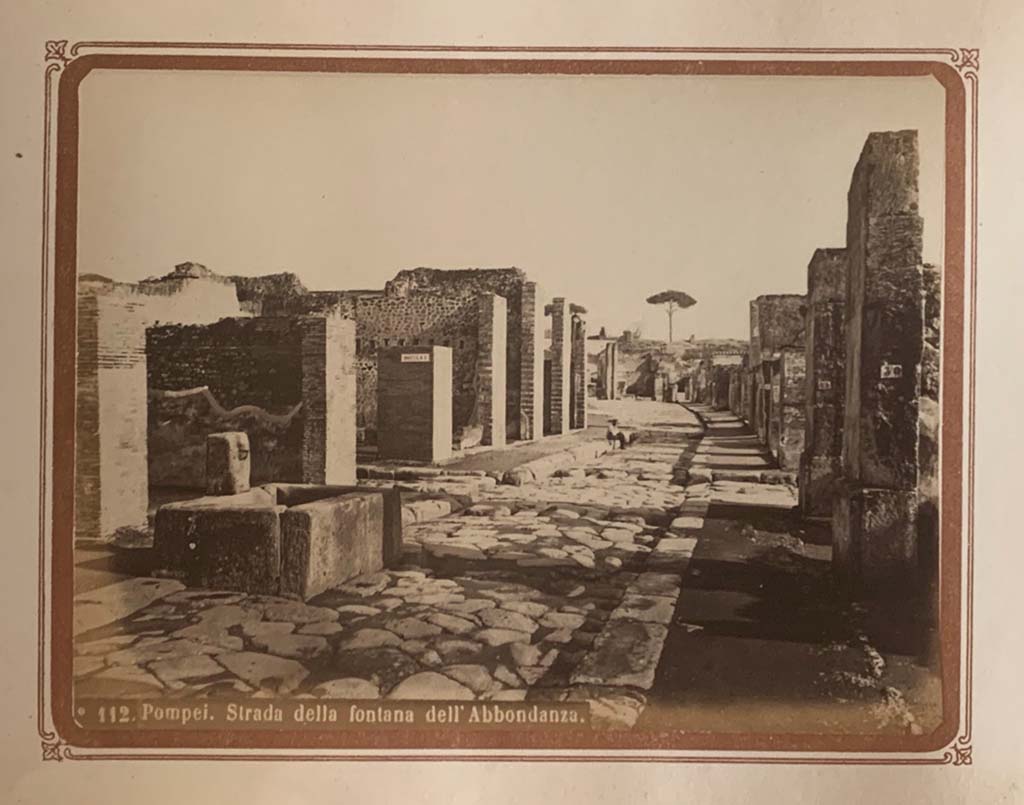 Fountain outside VII.14.13 and VII.14.14 on Via dellAbbondanza, Pompeii. From an album by Roberto Rive, dated 1868. 
Looking east from near fountain at VII.14.13/14. Photo courtesy of Rick Bauer.
