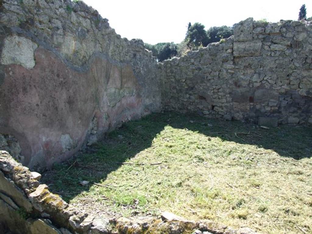 I.2.16 Pompeii.  March 2009. Room 6. Garden area.  Looking west across southern end to south west corner.