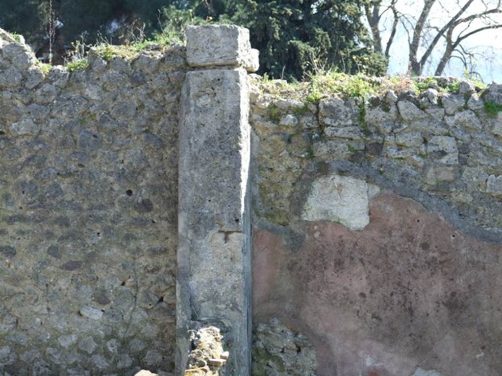 I.2.16 Pompeii.  March 2009.  Room 6.  Pillar on the south east corner of the Garden area, and painted plaster on the garden wall..