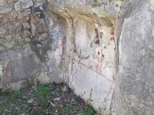I.2.17 Pompeii. September 2010. Room 6, south-west corner with detail of bed recess or niche. Photo courtesy of Drew Baker.
