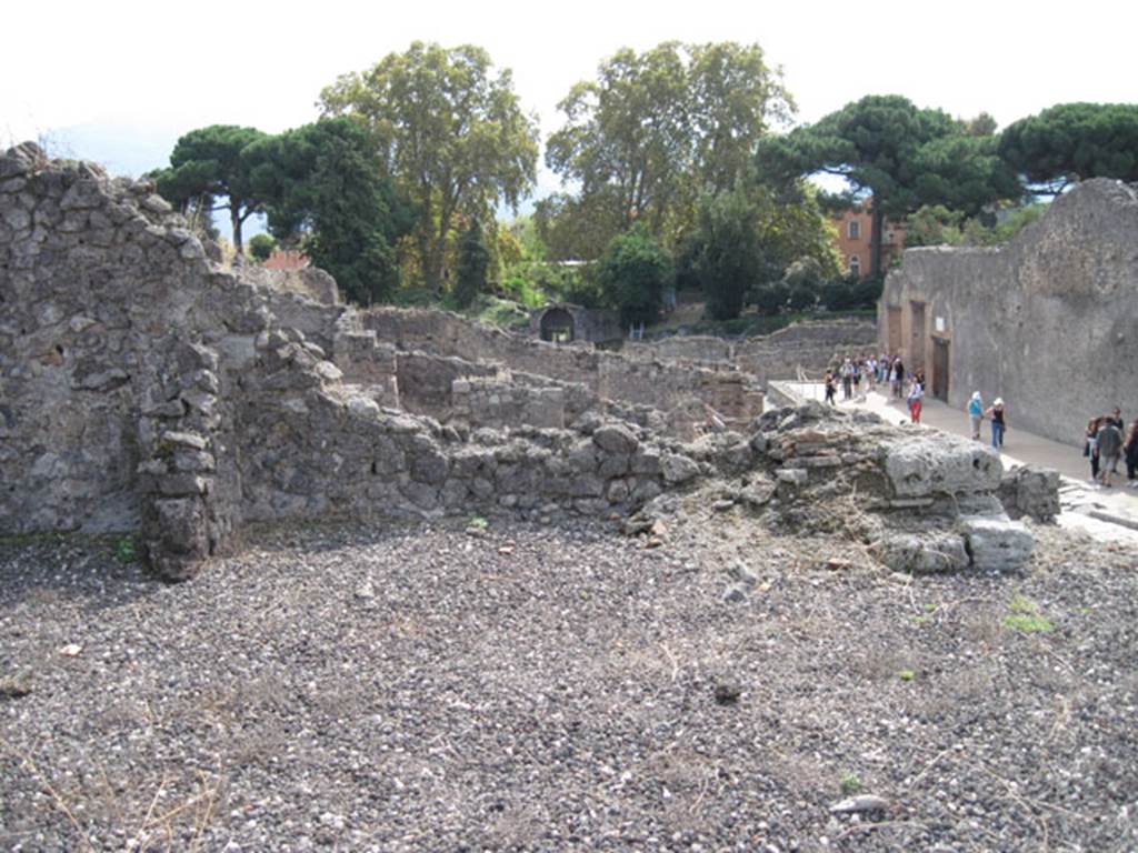 I.3.8a Pompeii. September 2010. Looking towards remains of south wall. Looking south overlooking the Stabian gate, Via Stabiana and the wall of the theatres. Photo courtesy of Drew Baker.
