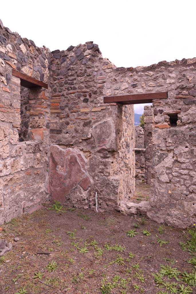 I.4.4 Pompeii. October 2019. 
South-east corner of shop-room, with window in east wall from rear room, and with doorway/window into I.4.3, in south wall. 
Foto Tobias Busen, ERC Grant 681269 DCOR.
