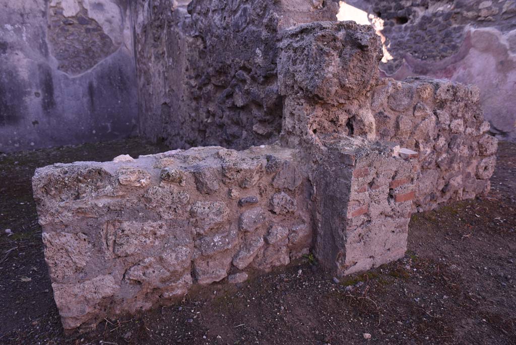 I.4.24 Pompeii. October 2019. 
Looking south to west side of dividing wall between shop and rear room, with I.4.23, on right.
Foto Tobias Busen, ERC Grant 681269 DCOR.
