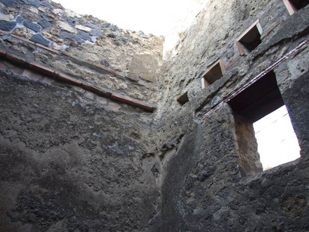 I.4.27 Pompeii.  December 2007.  North-east corner of rear room with window in east wall looking onto Vicolo del Citarista.
