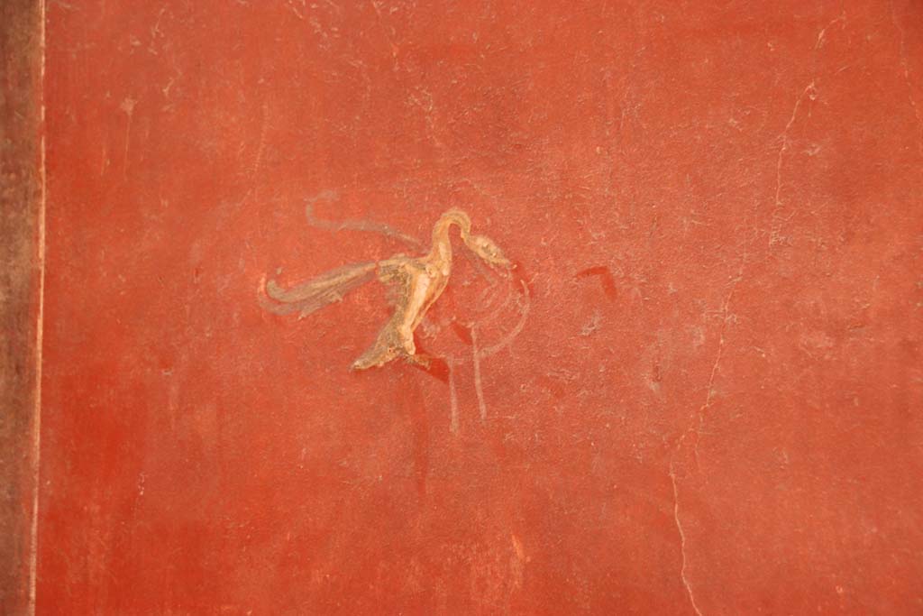 I.6.7 Pompeii. September 2019. 
Detail of painted decoration on south wall on west side of doorway in south-east corner of atrium.
Photo courtesy of Klaus Heese.
