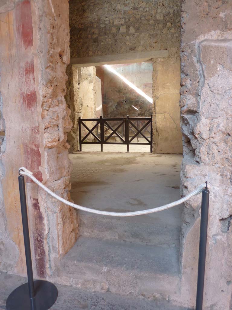 I.6.15 Pompeii. June 2019. Detail of threshold doorway to room 6, looking north.
Photo courtesy of Buzz Ferebee.
