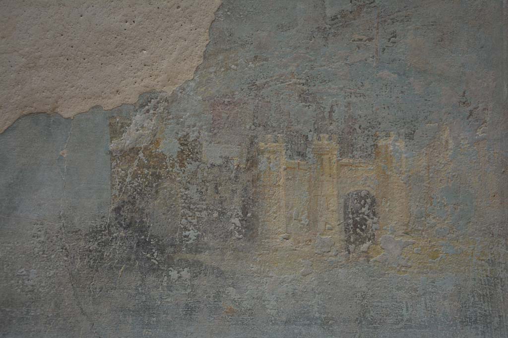 I.7.7 Pompeii. October 2019. 
Detail of town with high walls, towers and gates, palaces and temples, from central painting on east wall.
Foto Annette Haug, ERC Grant 681269 DCOR.
