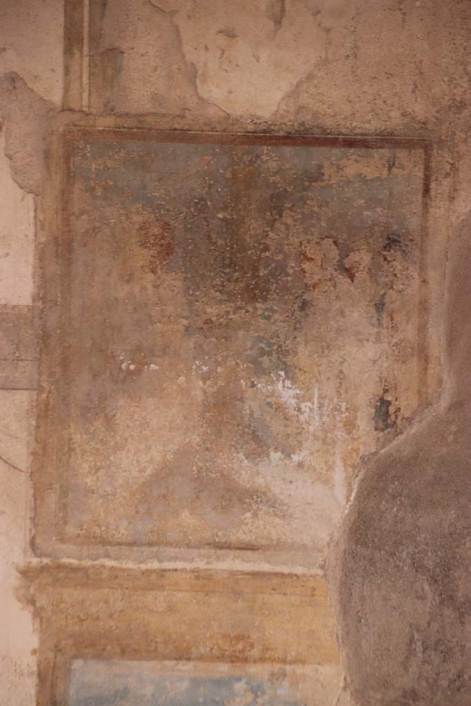I.7.11 Pompeii. September 2021. 
Detail of painted decoration from upper centre panel on north wall of triclinium. Photo courtesy of Klaus Heese.
