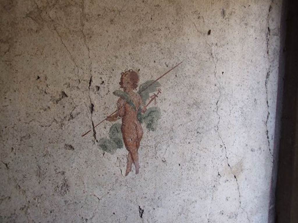 I.7.11 Pompeii. December 2006.Detail of wall painting of architecture and garlands from upper north wall of bedroom on west side of atrium.

