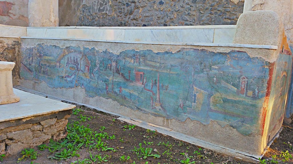 I.7.12 Pompeii. 2017/2018/2019. Painted panel on inside of west side of summer triclinium. Photo courtesy of Giuseppe Ciaramella.