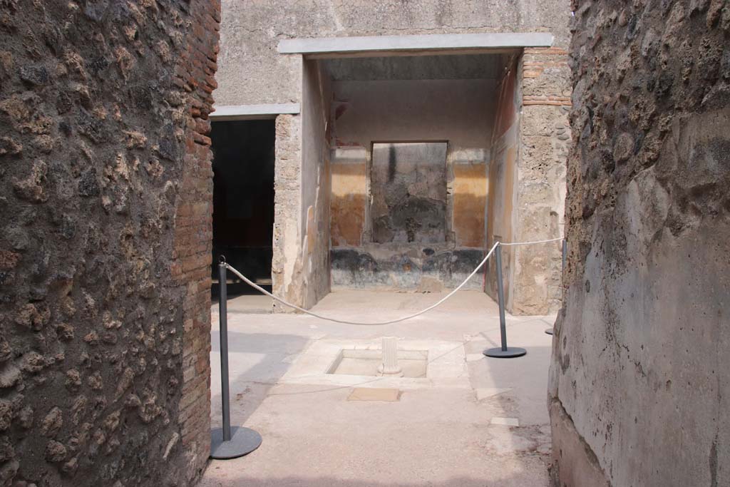 I.7.19 Pompeii. September 2021. 
Looking east across atrium towards tablinum with window, from entrance corridor. Photo courtesy of Klaus Heese.
