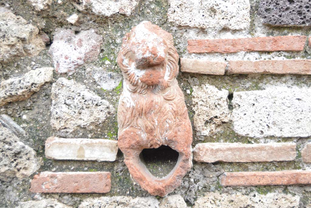 I.7.20 Pompeii. March 2018. Detail of terracotta water-spout in upper wall.
Foto Taylor Lauritsen, ERC Grant 681269 DCOR.
