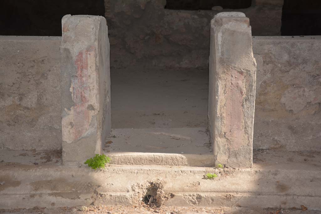  
I.8.17 Pompeii. March 2019. Atrium 3, looking east towards table-legs with remaining painted decoration. 
Foto Annette Haug, ERC Grant 681269 DCOR.
According to PPM  on each of these table-legs was a painting of a herm. 
See Carratelli, G. P., 1990-2003. Pompei: Pitture e Mosaici. I. Roma: Istituto della enciclopedia italiana, (p.852.)
