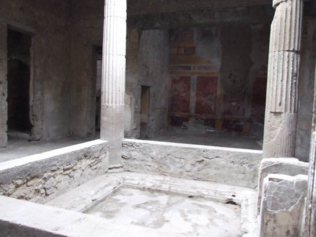 I.8.17 Pompeii. December 2007. Room 3, impluvium in atrium. Looking north.