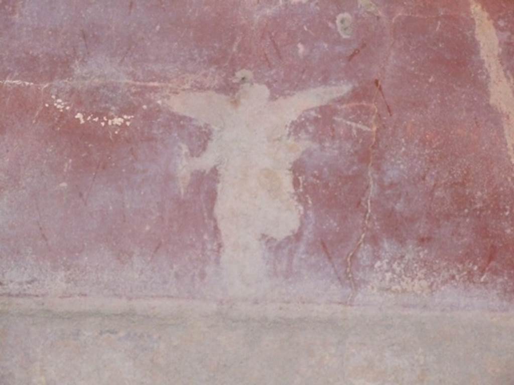 I.9.1 Pompeii. March 2009. Room 11, painting of winged figure on east wall.