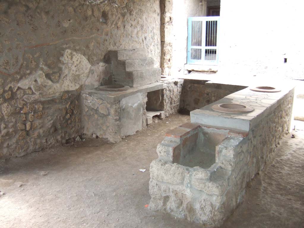 I.9.4 Pompeii. May 2015. Detail of display shelving against west wall. Photo courtesy of Buzz Ferebee.
