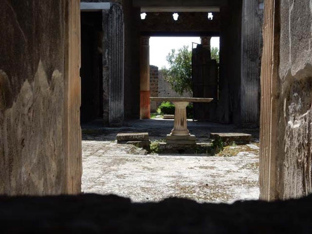 I.9.5 Pompeii. April 2022. Room 3, looking south across impluvium in atrium.
Photo courtesy of Johannes Eber.
