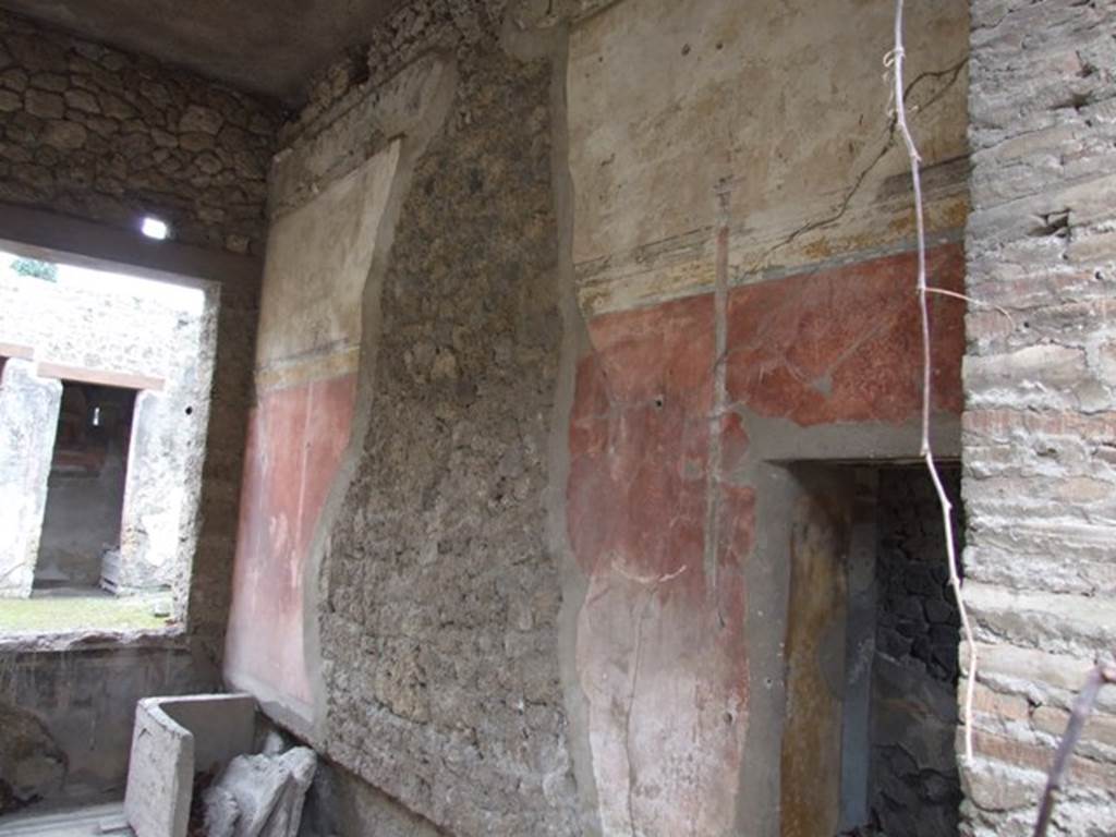 I.9.14 Pompeii. March 2009.   Room 6. Tablinum.  West wall, and doorway to Room 7.