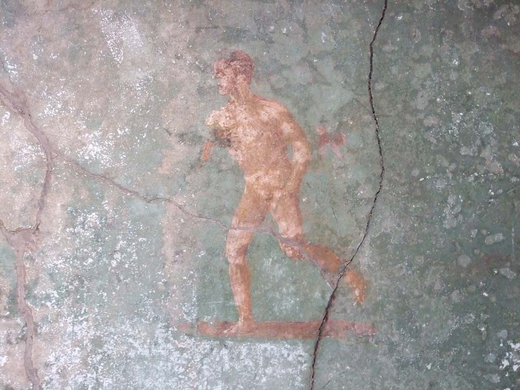 I.10.4 Pompeii. May 2006. Room 48, painting of athlete from east wall.