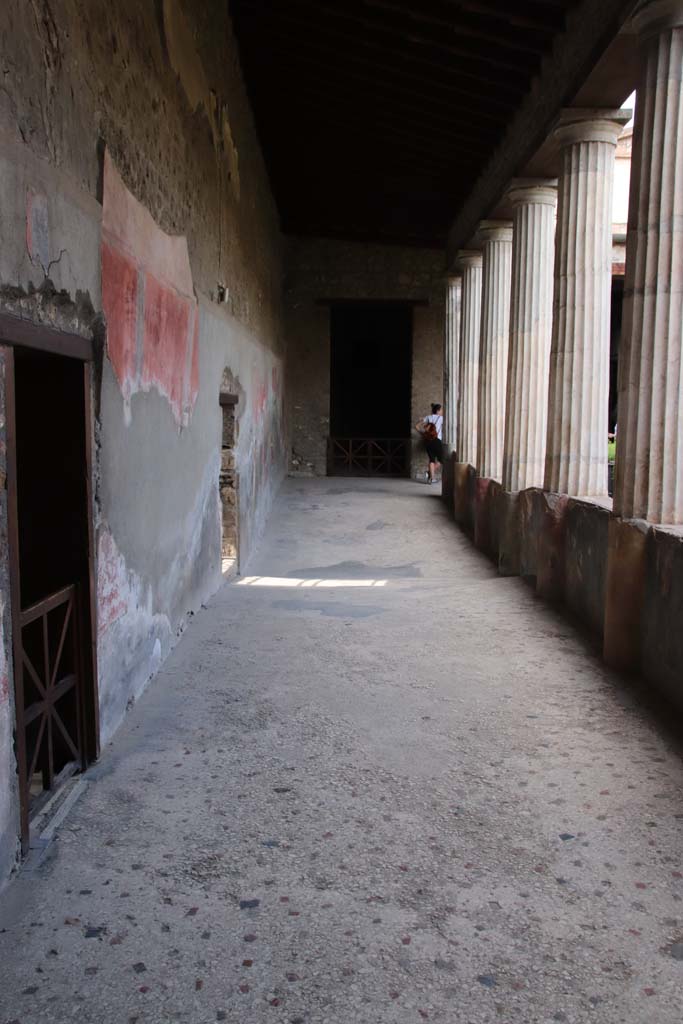 I.10.4 Pompeii. September 2021. 
Looking north from west portico towards doorway to room 11, in centre. Photo courtesy of Klaus Heese.
