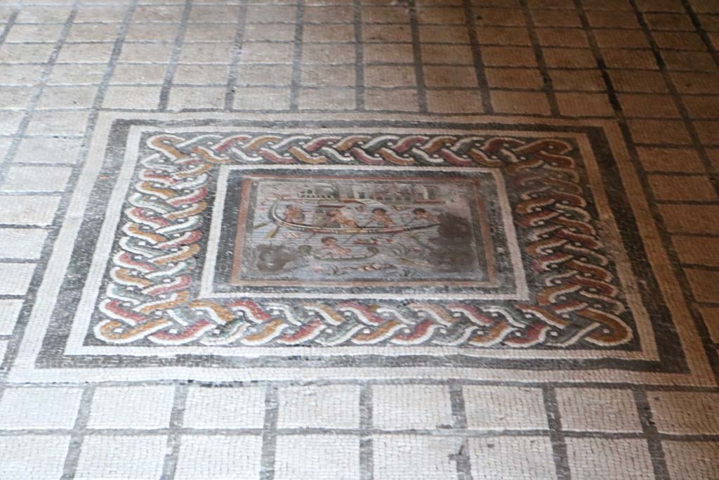 I.10.4 Pompeii. December 2018. 
Room 11, mosaic of pygmies in Nile scene in centre of mosaic floor. Photo courtesy of Aude Durand.
