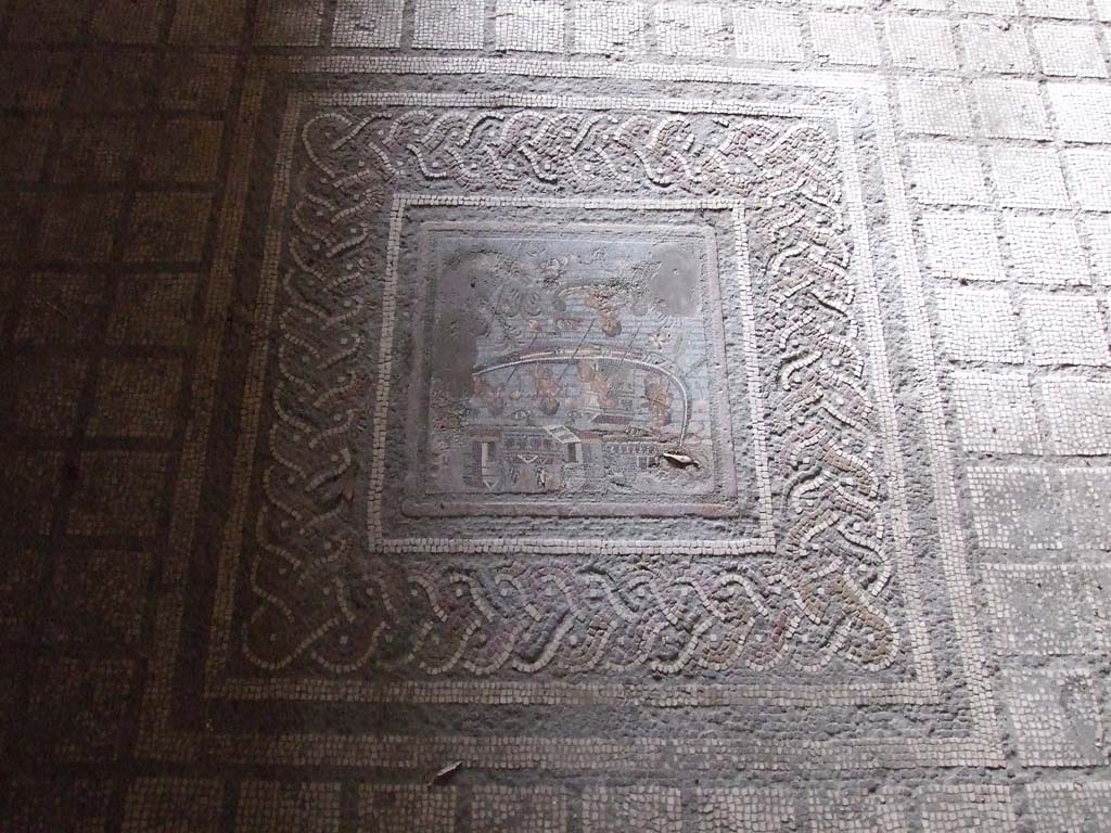I.10.4 Pompeii. December 2006. Room 11, emblema in the centre of mosaic floor.