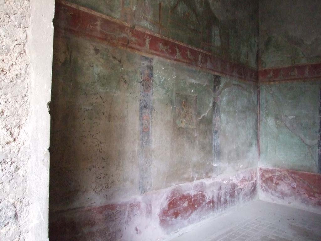 I.10.4 Pompeii. May 2010. Room 11, west wall.