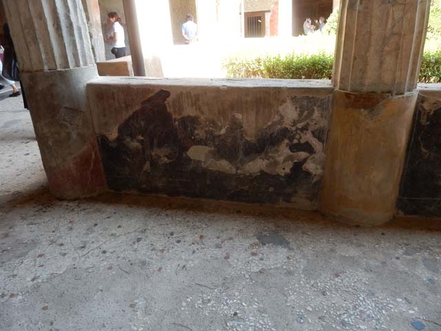 I.10.4 Pompeii. May 2010. Hole in west portico floor, ventilation for the Sarno canal.