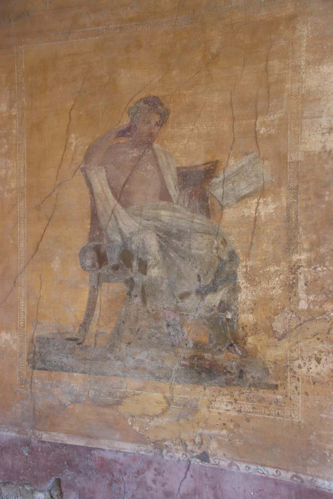 I.10.4 Pompeii. September 2021. 
Alcove 23, west wall with wall painting of poet. Photo courtesy of Klaus Heese.
