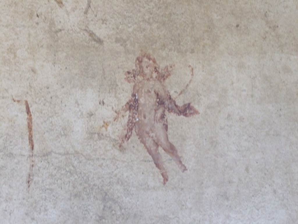 I.10.7 Pompeii. March 2009.   Room 3.  Cubiculum. West wall. Painting of flying cupid.
