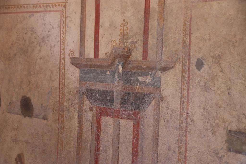 I.10.11 Pompeii. September 2021. Room 7, painted decoration on west wall. Photo courtesy of Klaus Heese.

