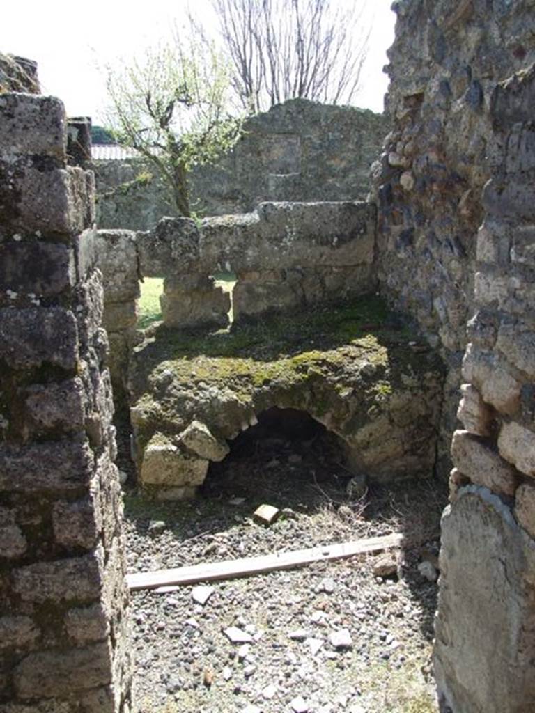I.12.16 Pompeii.  March 2009. Doorway to Room 5. Kitchen, on south side of small garden.
