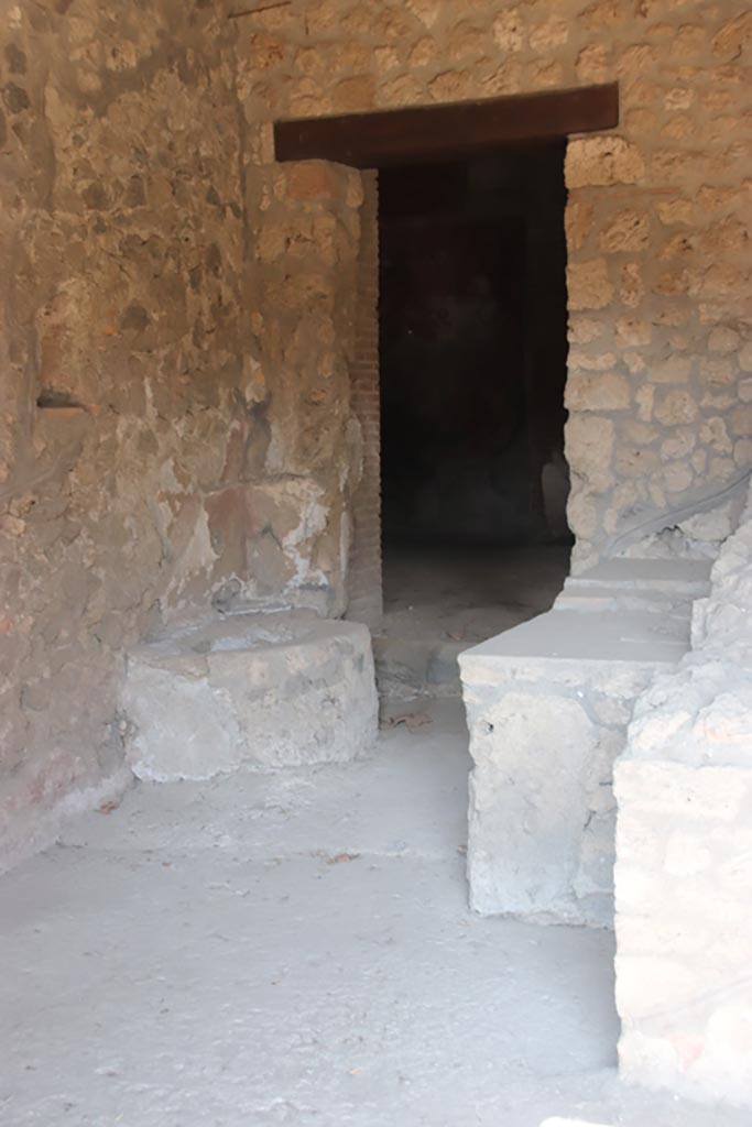 I.14.15 Pompeii. October 2022. 
Doorway to rooms on north side of bar-room. Photo courtesy of Klaus Heese.
