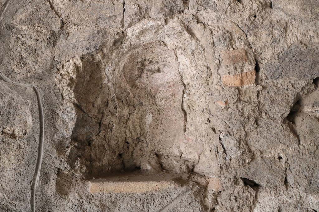 I.14.15 Pompeii. December 2018. Small niche set into west wall. Photo courtesy of Aude Durand.