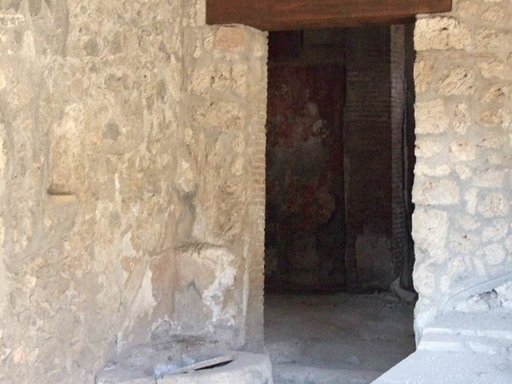 I.14.15 Pompeii.  December 2006. Doorway to room on north side of bar.