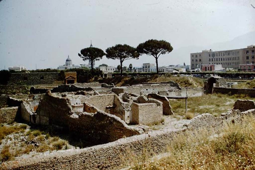 1.20.1 Pompeii. 1959. Looking south-east across southern end of I.20 towards new Pompeii. The garden of 1.20.1/2, and the rears of I.20.3/4 can be seen. The Nocera gate can be seen on the centre right. On the left is the south end of the vineyard at I.20.5
Photo by Stanley A. Jashemski.
Source: The Wilhelmina and Stanley A. Jashemski archive in the University of Maryland Library, Special Collections (See collection page) and made available under the Creative Commons Attribution-Non Commercial License v.4. See Licence and use details.
J59f0463
