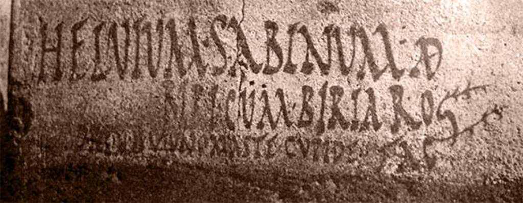 II.1.12 Pompeii. Found in 1958. Wall on south side of entrance doorway.
Inscription below Mercury and Bacchus painting.

HELVIVM SABINVM AED
BIRI CVM BIRIA ROG
D. R. P. V. B. O. V. F. ONOMASTE CVPIDE FAC       [CIL IV 9885]
See Corpus Inscriptionum Latinarum Vol. IV, Supp P3, F4, 1970. Berlin:De Gruyter, p. 129. 

According to Epigraphik-Datenbank Clauss/Slaby (See www.manfredclauss.de), it read 

Helvium  Sabinum  aed(ilem)
Biri  cum  Biria  rog(ant)
d(ignum)  r(ei)  p(ublicae)  v(irum)  b(onum)  o(ro)  v(os)  f(aciatis)  Onomaste  cupide  fac(iatis)       [CIL IV 9885]

According to Cooley this translates as 
Biri(us) with Biria ask you to elect Helvius Sabinus aedile, a good man, worthy of public office: Onomastus, vote for him eagerly. 
See Cooley, A. and M.G.L., 2004. Pompeii: A Sourcebook. London: Routledge, F52, p. 122.
