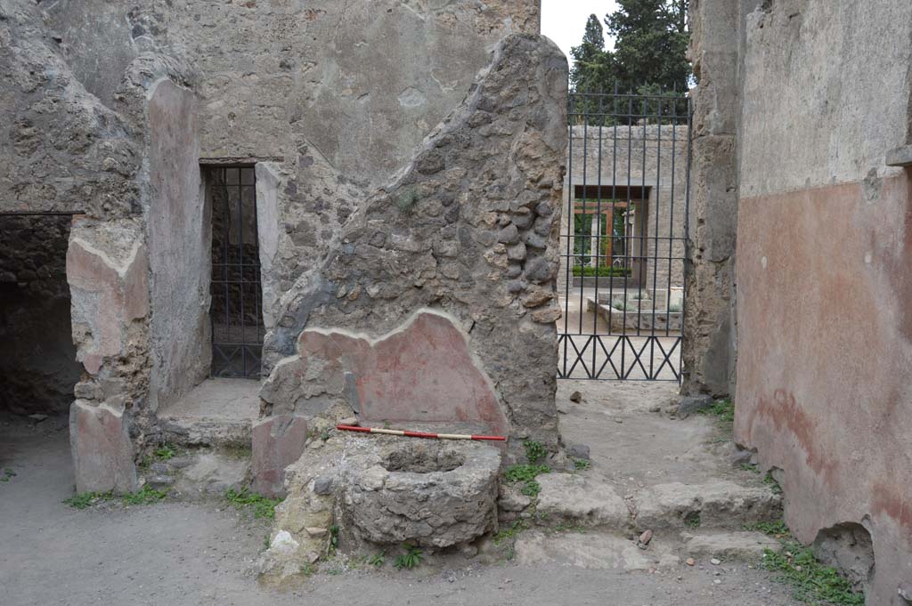 II.2.3 Pompeii. October 2017. 
Looking south towards small doorway, centre left, leading into room 3, of II.2.2, with a doorway to the atrium, on right.
Foto Taylor Lauritsen, ERC Grant 681269 DCOR.

