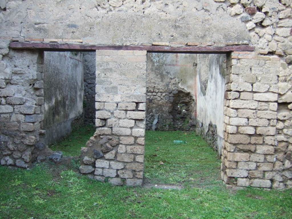 III.4.1 Pompeii. December 2005.  Doorway and window in north wall.