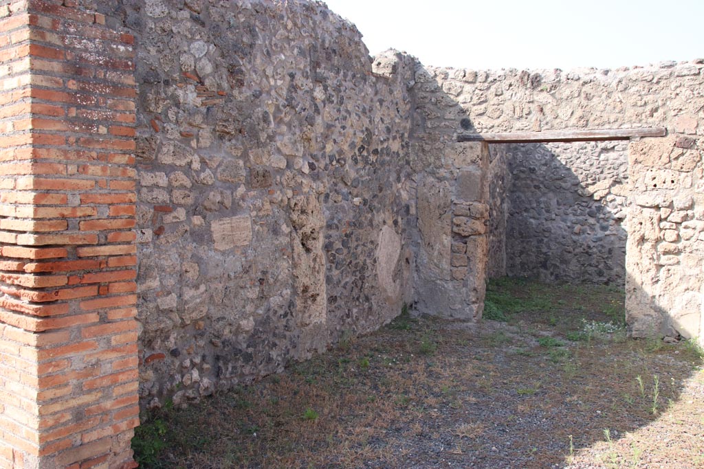 V.2.2 Pompeii. October 2023. West wall of shop-room, looking north. Photo courtesy of Klaus Heese.