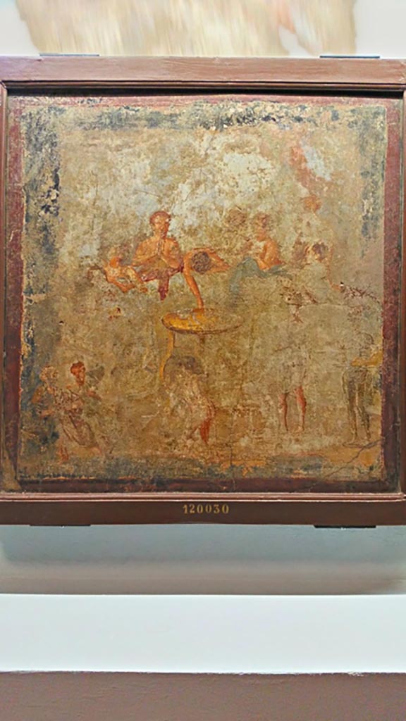 V.2.4 Pompeii. Room 15, painting of banqueting scene from west wall of triclinium.
On display in Naples Archaeological Museum, inv. 120030.
Photo courtesy of Giuseppe Ciaramella, June 2017.
