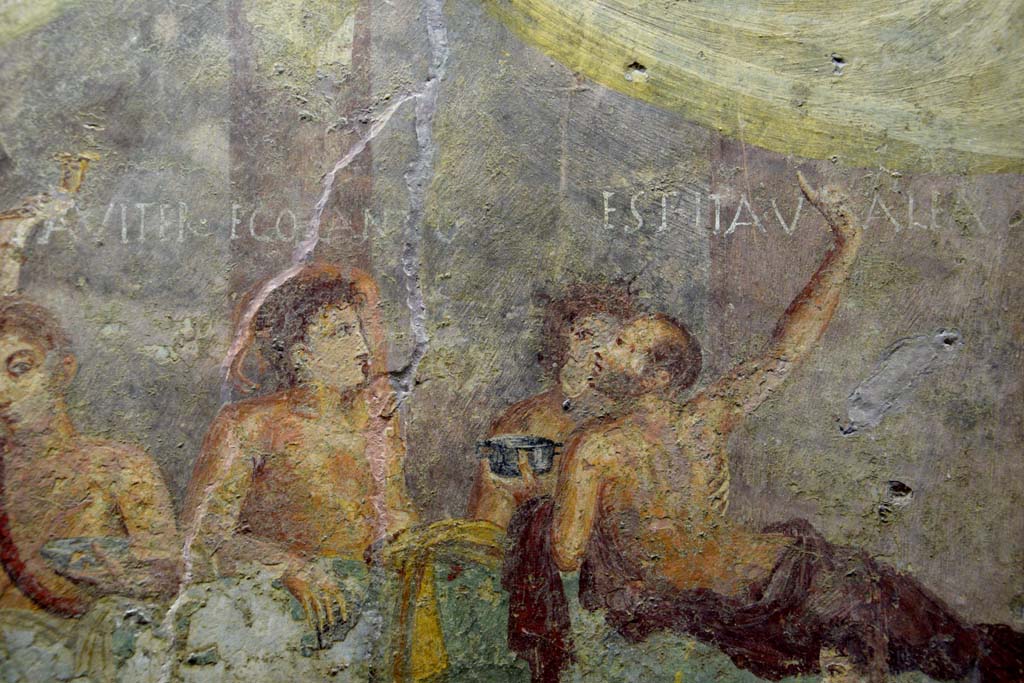 V.2.4 Pompeii. June 2017. 
Room 15, detail from east end of the painting of banqueting scene from north wall of triclinium. Photo courtesy of Johannes Eber.
