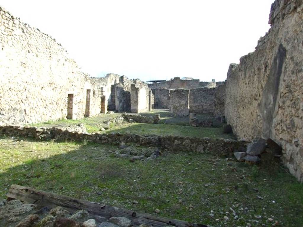 V.2.10 Domus of Paccia.  Looking south from room 12 across peristyle to front of house.
