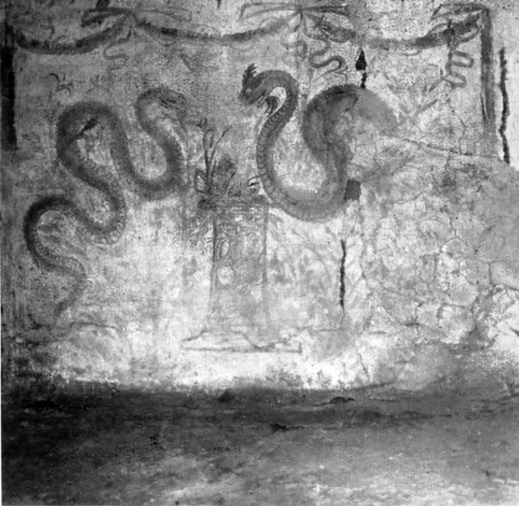V.2.i Pompeii. 1930s photo by Tatiana Warscher. Room 26, lararium painting on west wall.  
Two serpents approaching a round altar painted in a marble pattern, with a fire and a pine cone on the top.
Above is a triple garland below which is a single bird in flight.
See Boyce G. K., 1937. Corpus of the Lararia of Pompeii. Rome: MAAR 14.  (p.38, no.110 and Pl. 28,2)
See Fröhlich, T., 1991. Lararien und Fassadenbilder in den Vesuvstädten. Mainz: von Zabern. (L49).

