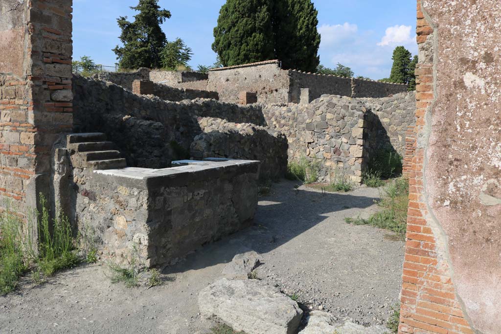 VI.1.5, Pompeii. December 2018. Looking towards counter on north side of entrance. Photo courtesy of Aude Durand.