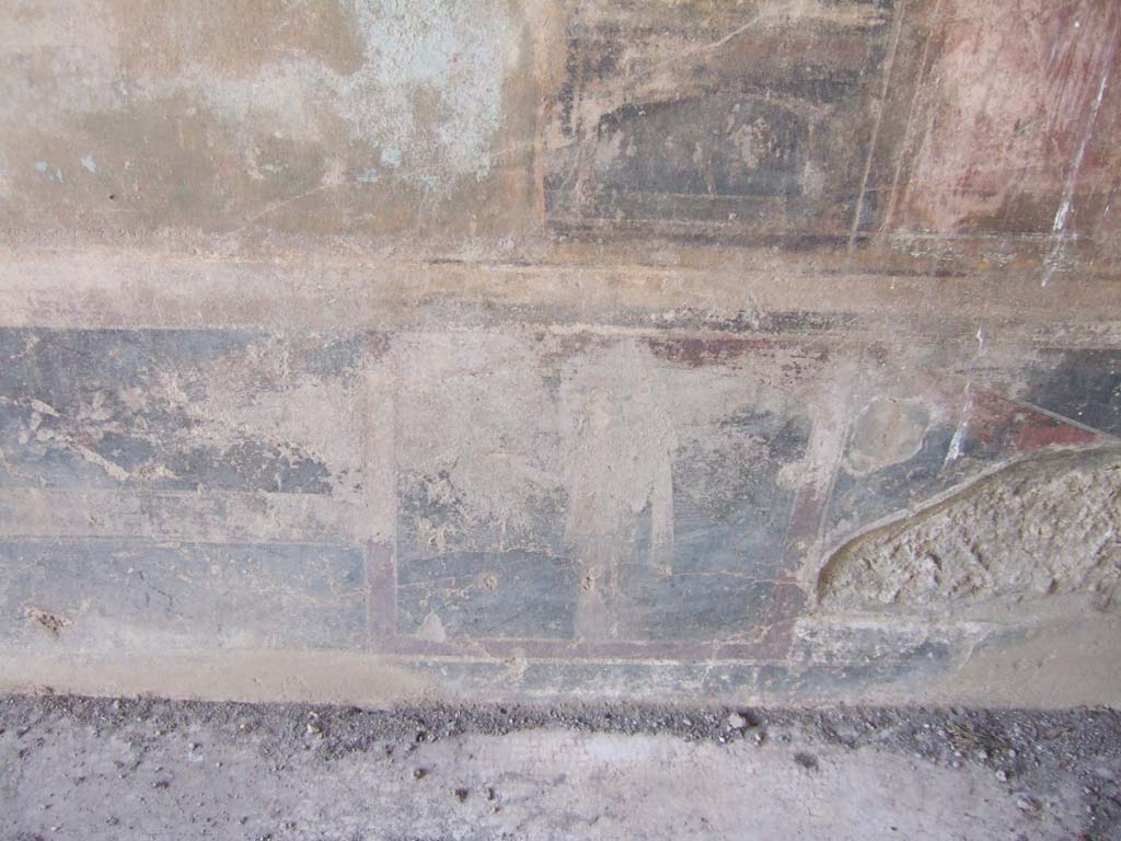 VI.2.14 Pompeii. September 2005. Detail from lower west wall of triclinium, centre and north end. 