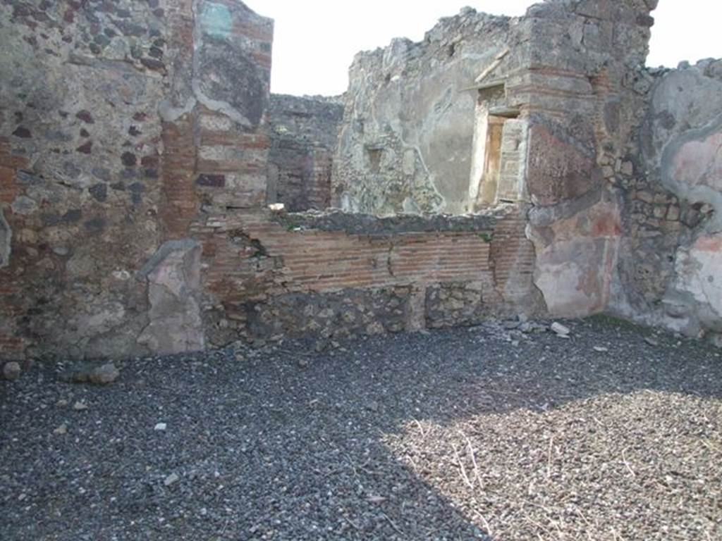 VI.7.6 Pompeii. March 2009. Room 10,  west wall of triclinium, with remains of a window onto garden area.
