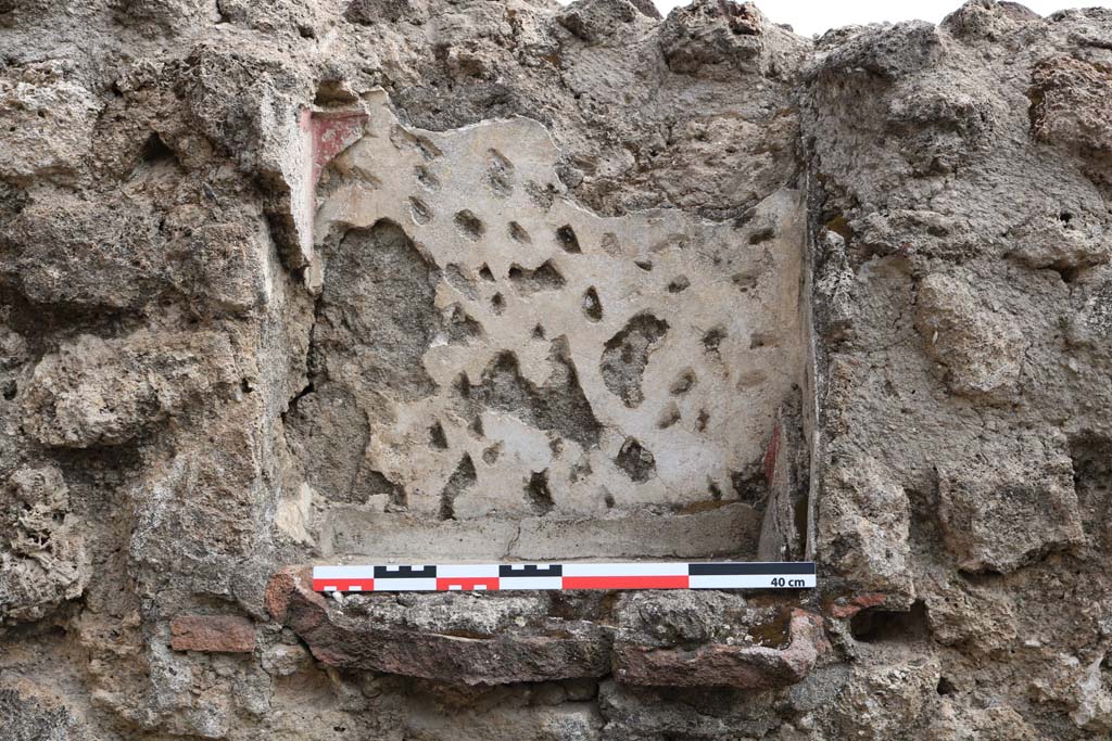 VI.8.8 Pompeii. December 2018. Detail of niche in east wall of rear room. Photo courtesy of Aude Durand.