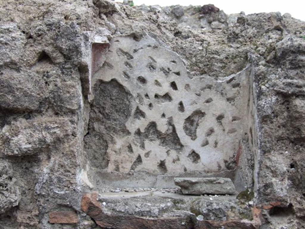 VI.8.8 Pompeii.  December 2007.  Niche on east wall of rear room.
According to Boyce, the inside walls were decorated with red lines and spots on a white background, its floor projected like a narrow shelf. Fiorelli called it la nicchia dei Penati.  See Boyce G. K., 1937. Corpus of the Lararia of Pompeii. Rome: MAAR 14.  p49 ( no.169)

