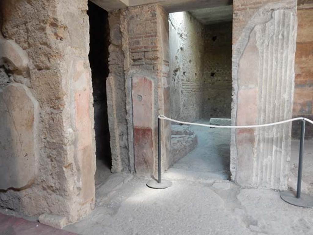 VI.8.24 Pompeii. May 2017. South-west corner of atrium, with doorway to small storeroom, on left, and corridor, on right. Photo courtesy of Buzz Ferebee.
